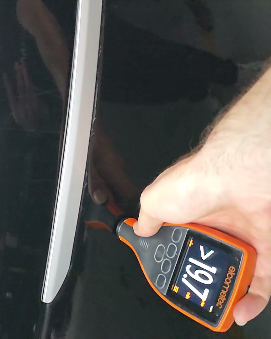 A paint-thickness gauge confirms what the eye suspects.
