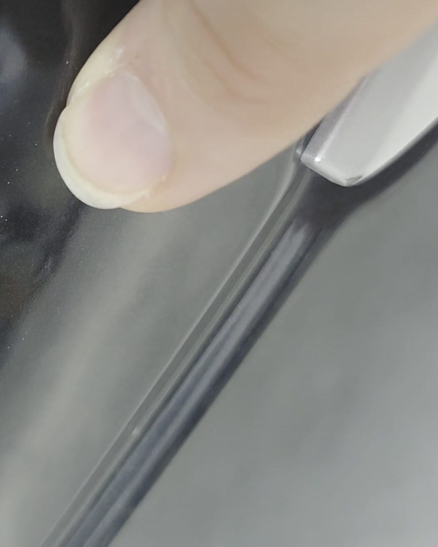Check trims and edges for overspray and masking lines.