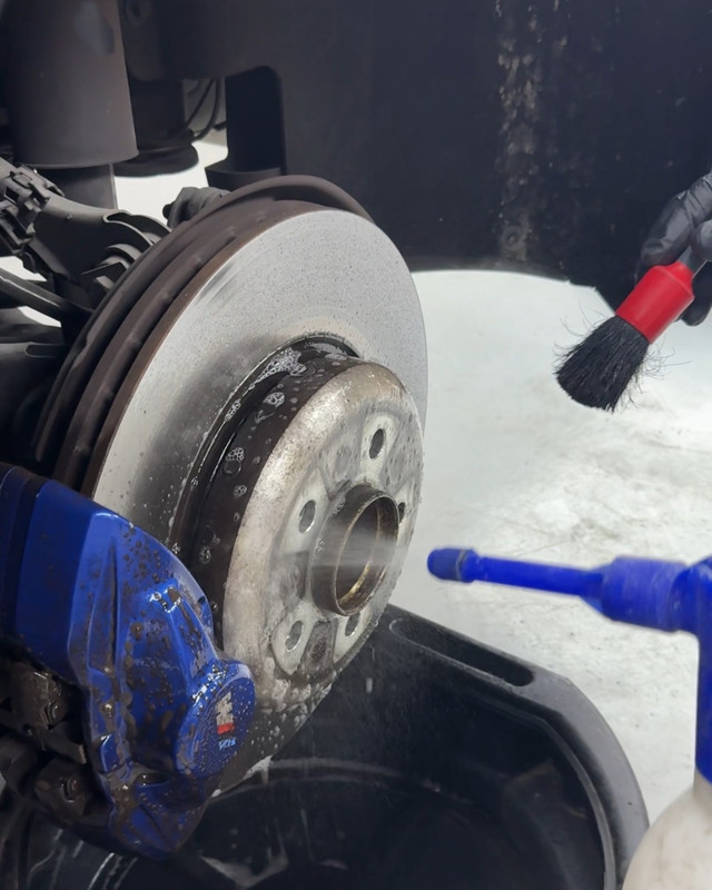 Brake caliper and disc cleaned before refinishing