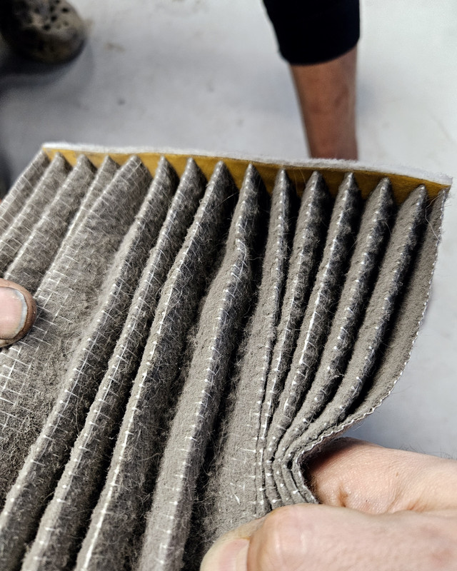 Clogged AC cabin filter removed from a car