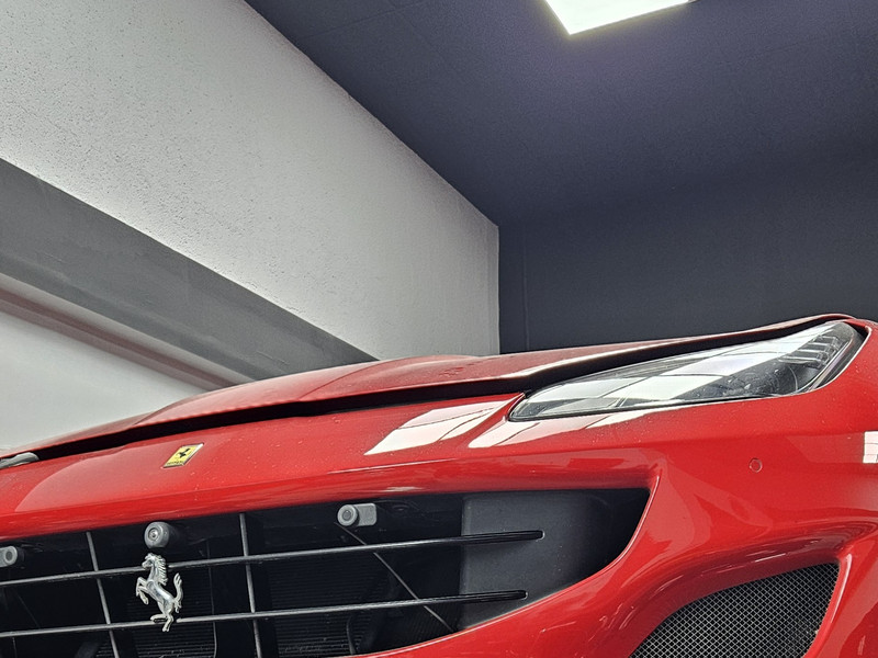 Ferrari on the lift during mechanical work at Bella Motor, Dubai