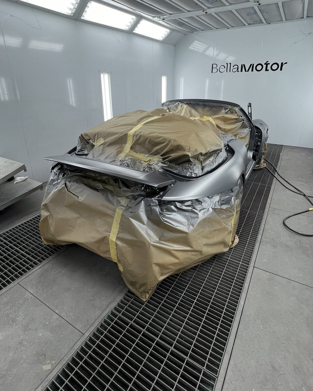 Paint booth with a masked car