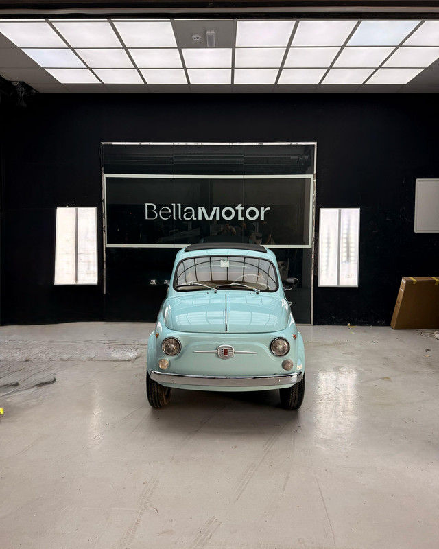 Classic Fiat 500 in the Bella Motor showroom bay