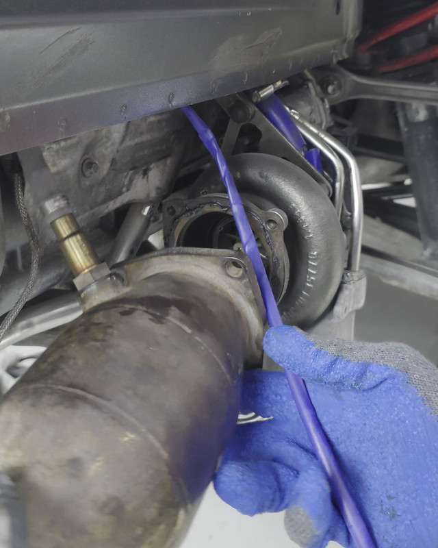 Turbocharger and catalytic converter inspected from below