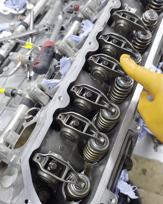 Cylinder head with valves and springs on the bench