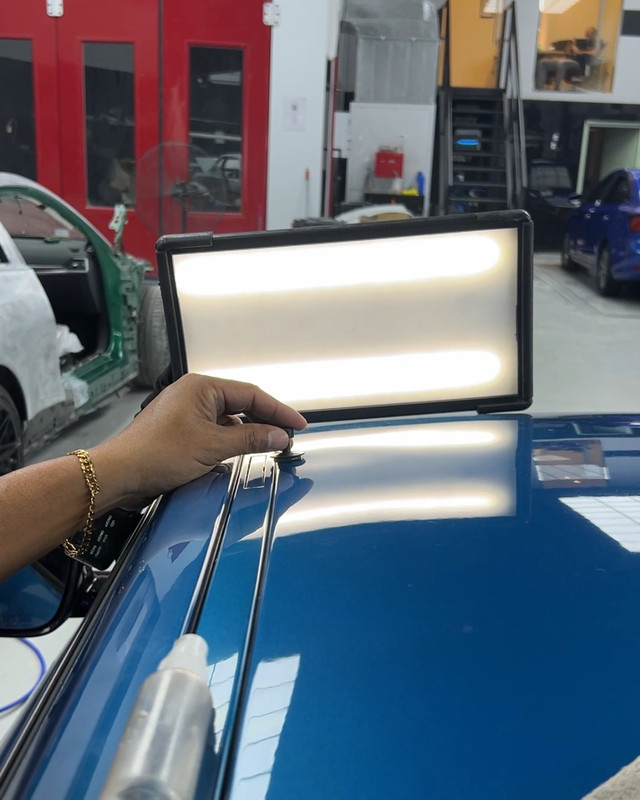 Paintless dent repair with a PDR light board