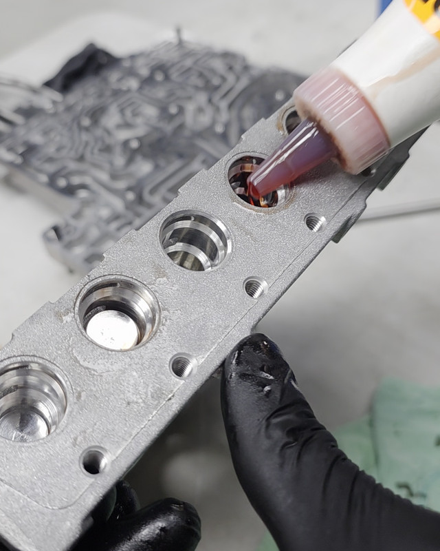 Sealant applied during transmission reassembly
